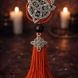 amulette protection sacrée cordon rouge symbole spirituel Brisylis